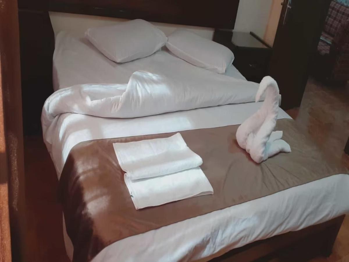 Al-Nujoom Hotel Suites Amman Zewnętrze zdjęcie